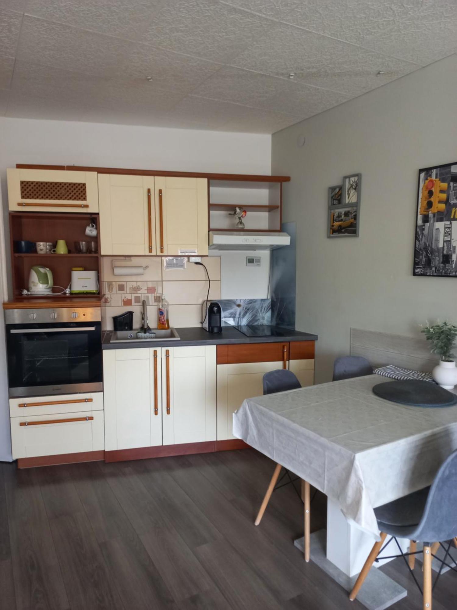 Berik Apartman Печ Екстериор снимка